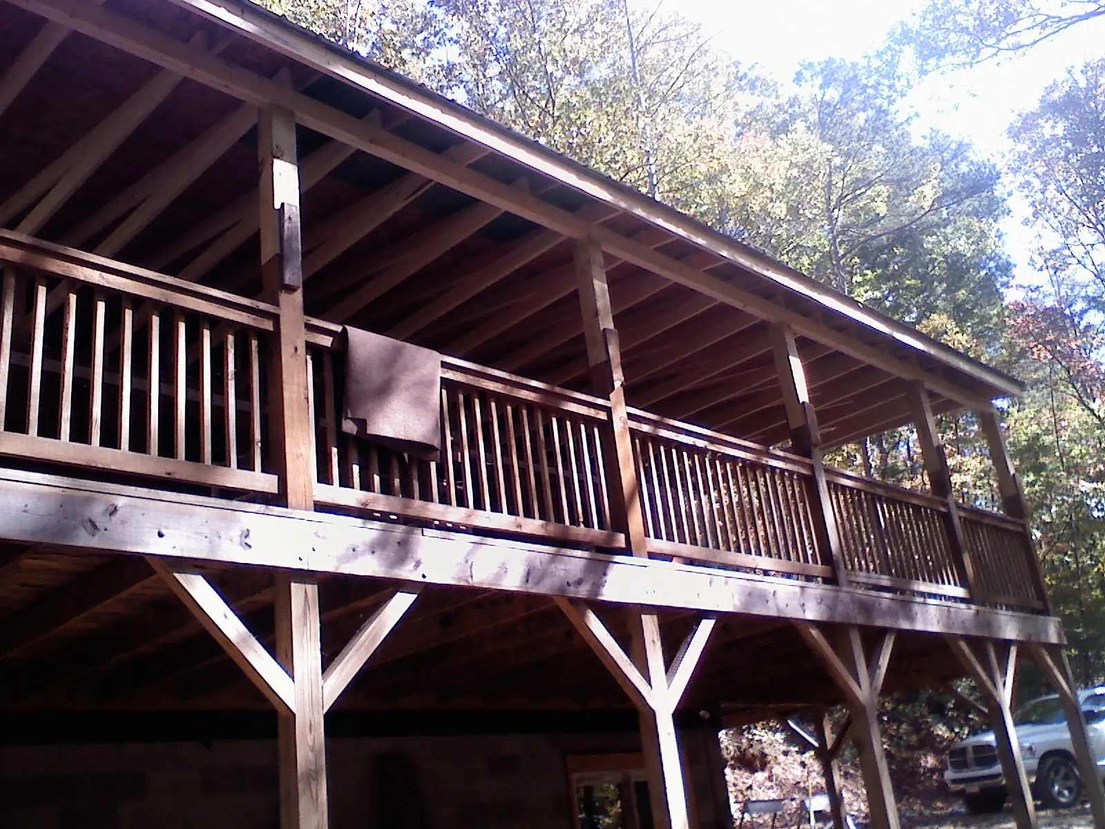 Timber framing under a new elevated porch and deck — Roof Leak Repair in Stanleytown by Roofing Brothers